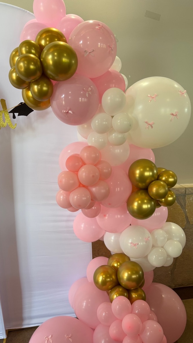 Elegant blush, white, and gold balloon garland