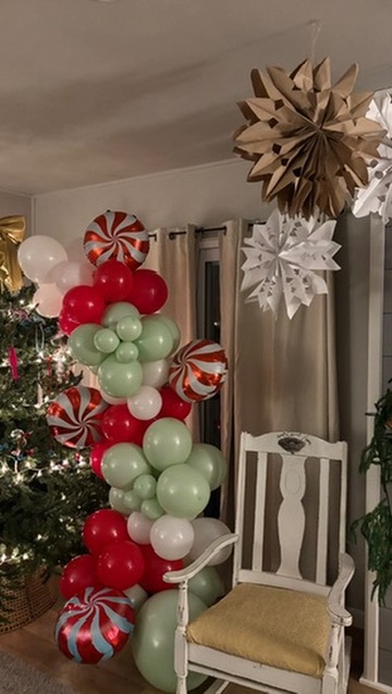 Christmas holiday balloon column with candy cane accents