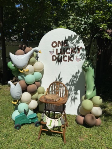One Lucky Duck first birthday full backdrop setup